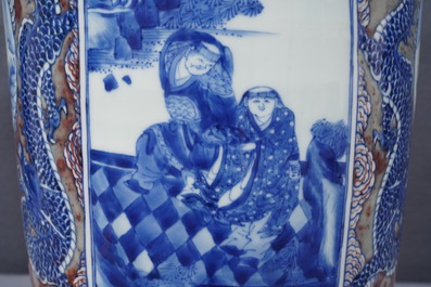 A rare Chinese blue, white and underglaze red rouleau vase, Kangxi
